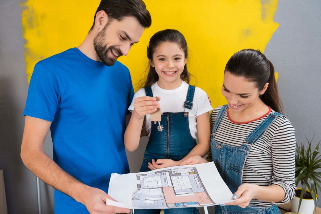 family looking at perfect floorplan